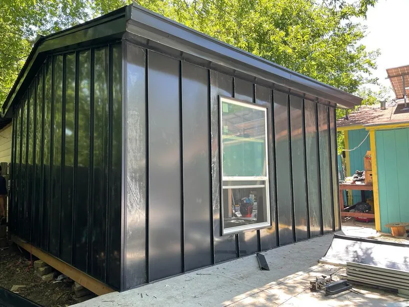 Black standing seam metal wall panels for Roof Inspection in Bolingbrook